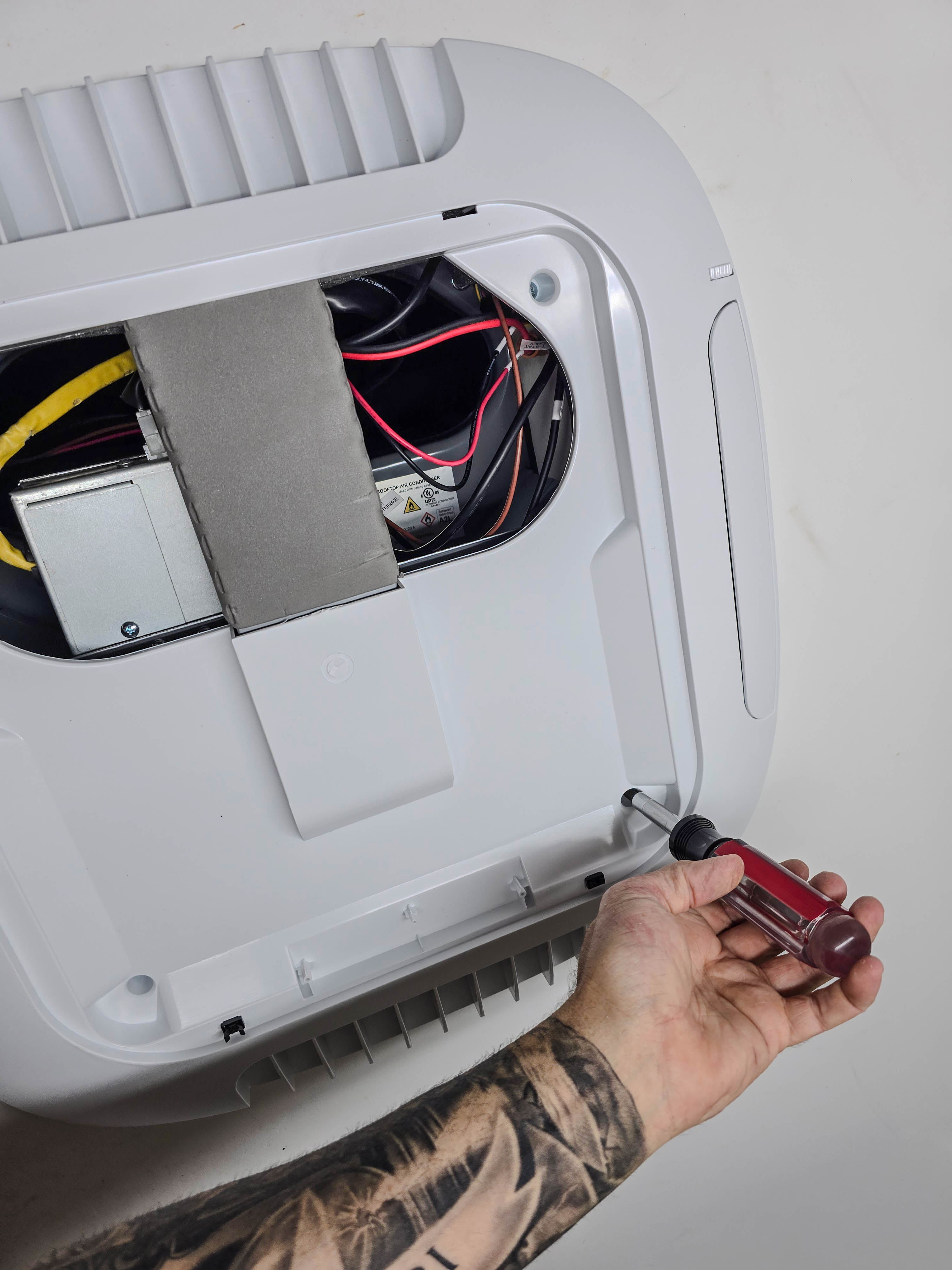 Installing the plastic cover with vents
